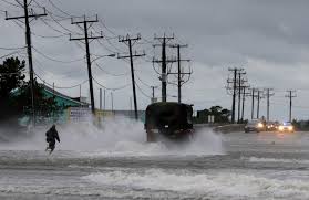 truck driving through flood
