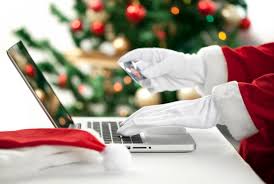 santa claus typing on laptop